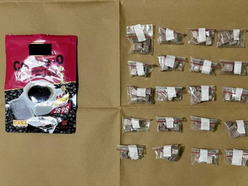 One of the coffee packets (left) holding what is believed to be packets of heroin. It was seized by the Central Narcotics Bureau during a raid on Jan 5, 2022. 