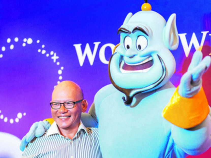 Disney's genie with Make A Wish Foundation Singapore's board chairman and spokesperson Dr Keith Goh at a special meet-and-greet session for beneficiaries of Singapore's only wish-granting foundation.