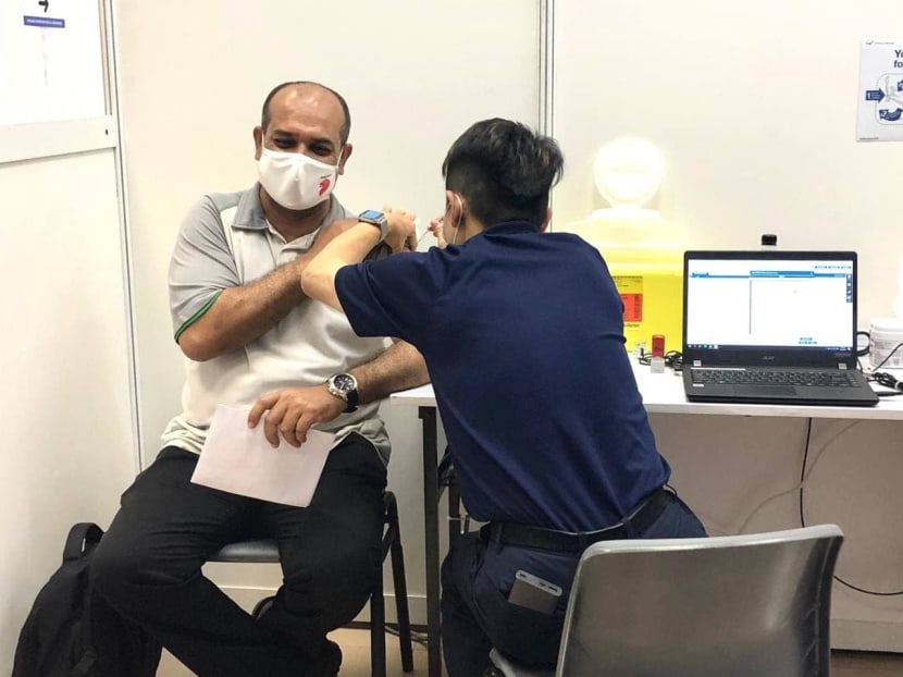 A bus captain from Tower Transit Singapore getting vaccinated against the Covid-19 coronavirus.