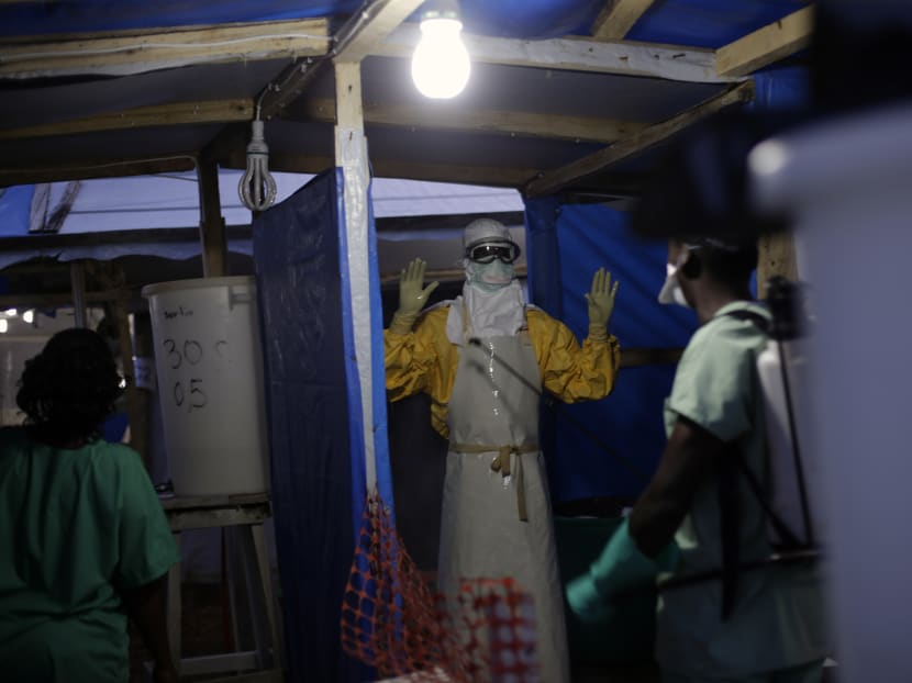 Malaria likely killed many more people than Ebola in Guinea during last year’s biggest-ever outbreak, as experts suspect many people with potential symptoms of the mosquito-spread disease stayed away from health clinics, afraid they might catch Ebola instead, a new study suggests. Photo: AP