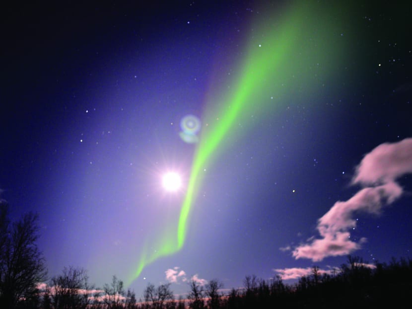 A shooting star and aurora borealis seen across the sky. TODAY file photo