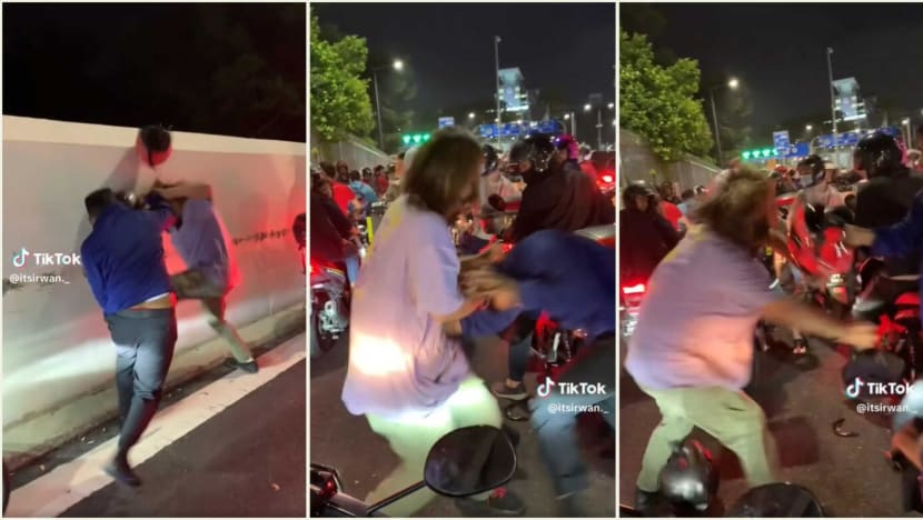Two men who fought with motorcycle helmets at Woodlands Checkpoint detained by authorities Two men who fought with motorcycle helmets at Woodlands Checkpoint detained by authorities