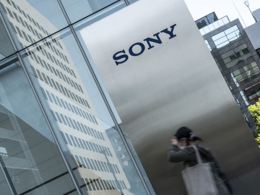 This photo taken on Oct 31, 2022 shows a woman walking past the Sony logo outside the company's headquarters in Tokyo. This photo taken on Oct 31, 2022 shows a woman walking past the Sony logo outside the company's headquarters in Tokyo.