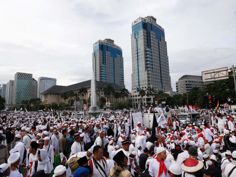 Indonesian Muslims gather to attend a rally calling for the arrest of Jakarta's Governor Basuki Tjahaja Purnama, popularly known as Ahok, who is accused of insulting the Koran, in Jakarta, Indonesia Dec 2, 2016. Photo: Reuters
