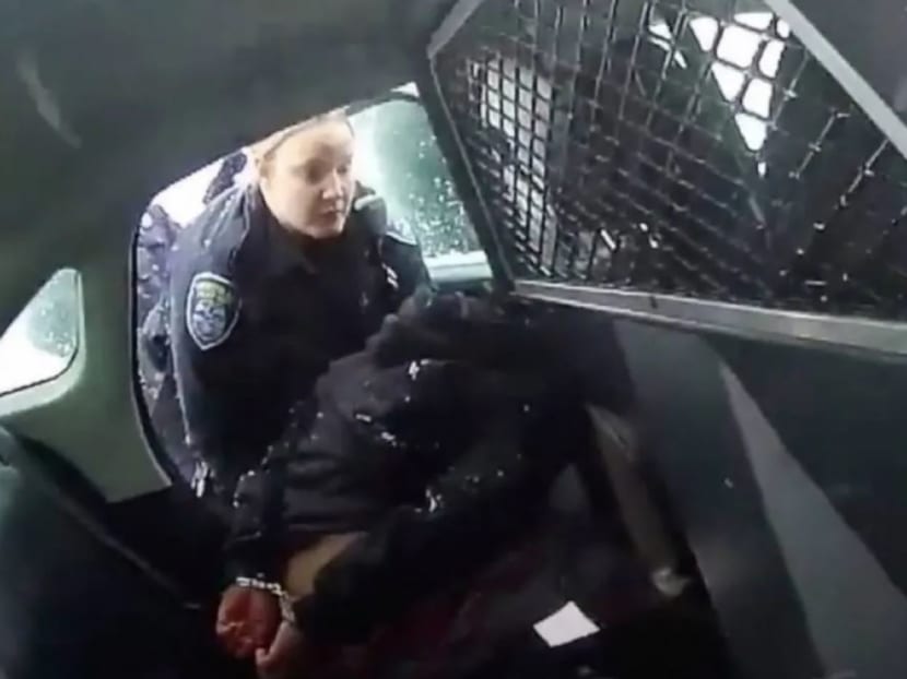 Officers called to the scene on Friday responded by handcuffing her, before trying to force her into a car and pepper-spraying her when she resisted, body cam videos released by the city's police force showed.