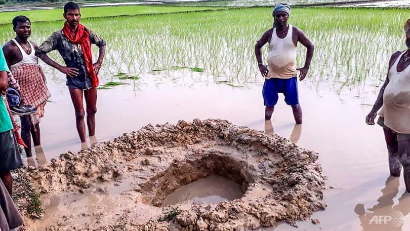 India farmers shocked as suspected meteorite crashes into rice field India farmers shocked as suspected meteorite crashes into rice field