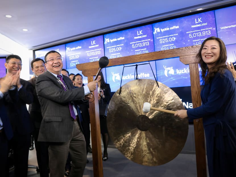 Luckin Coffee chief executive Jenny Qian and non-executive chairman Charles Lu at the company's initial public offering on Nasdaq in New York on May 17, 2019.