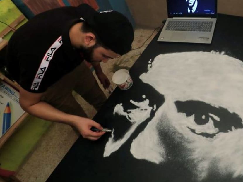 Egyptian artist crafts pictures with salt Egyptian artist crafts pictures with salt