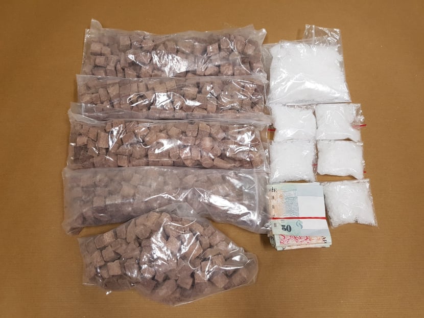 Heroin and ‘Ice’ and cash seized in CNB operation on 26 October 2016. Photo: CNB