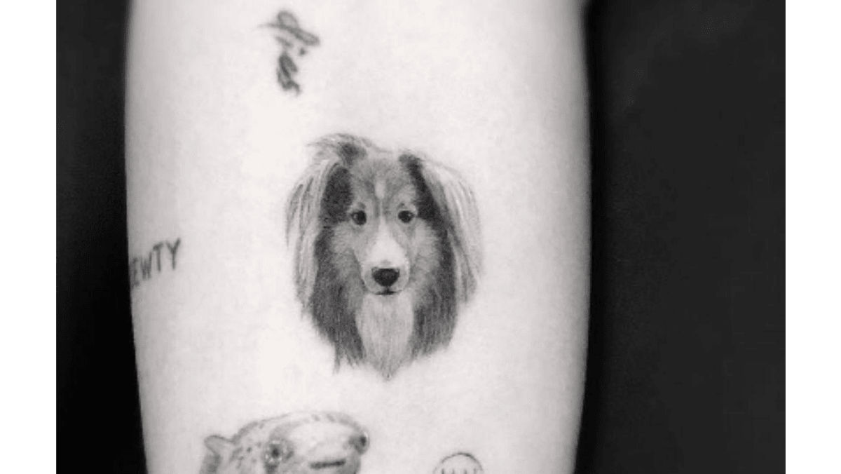 Miley Cyrus gets dog tattoo 8 Days
