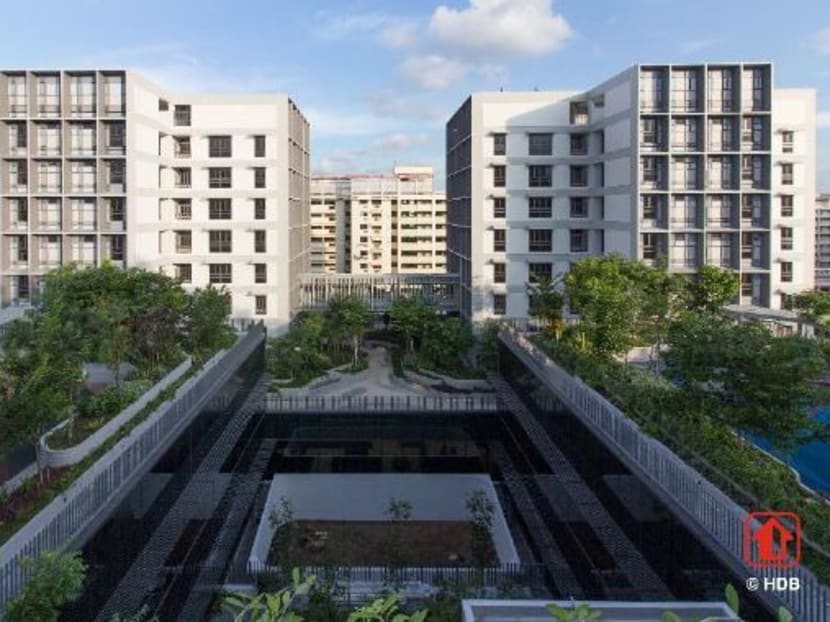 The two residential blocks for the elderly are connected to communal facilities such as lush green spaces and fitness corners. Photo: HDB