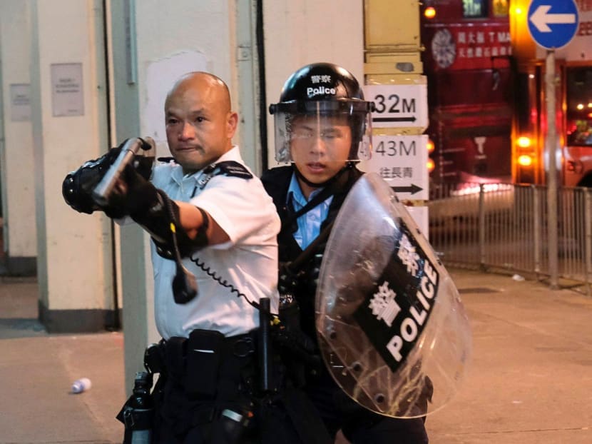 The officer faced intense criticism for aiming a gun directly at protesters. The officer faced intense criticism for aiming a gun directly at protesters.