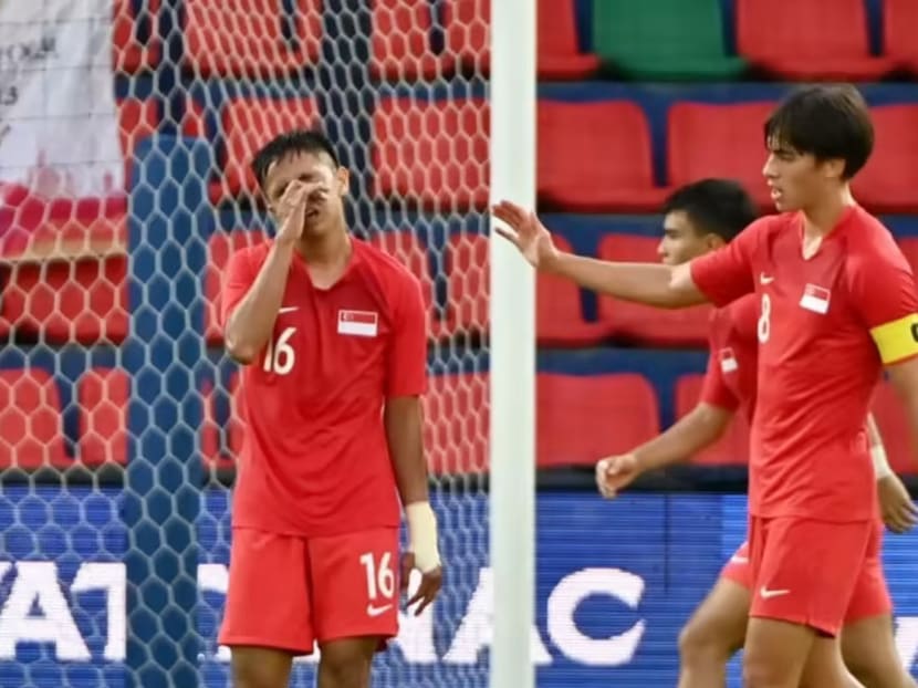 Singapore's footballers react after conceding a goal in a 3-1 defeat by Vietnam at the 32nd Southeast Asian Games on May 3, 2023.