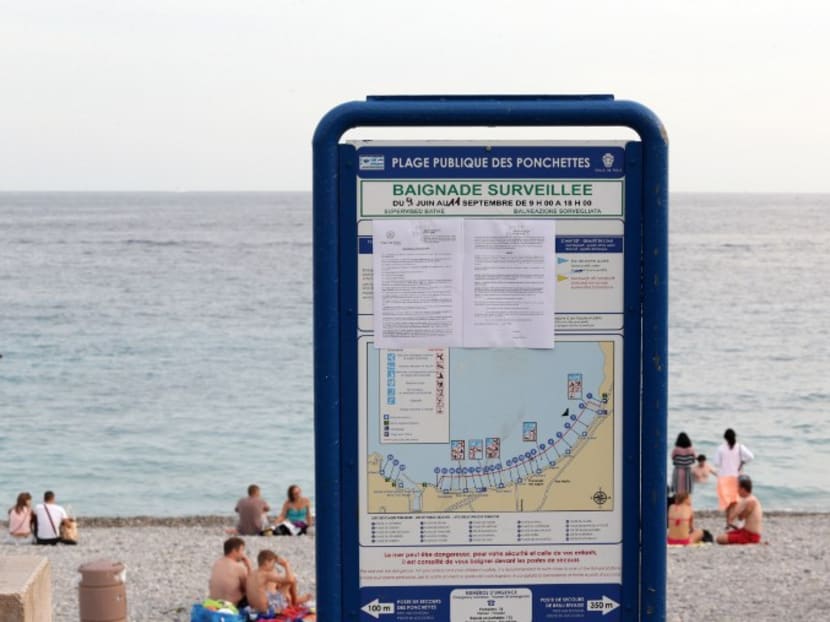 This picture taken on August 19, 2016 shows the bylaw forbidding women to wear Burkini at the Ponchettes beach, in Nice, southeastern France on August 19, 2016. Photo: AFP