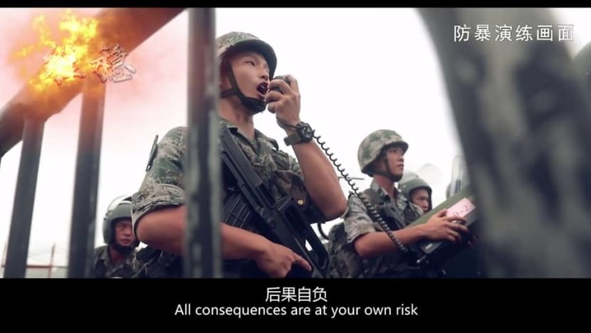 China warns Hong Kong protesters with slick military video China warns Hong Kong protesters with slick military video