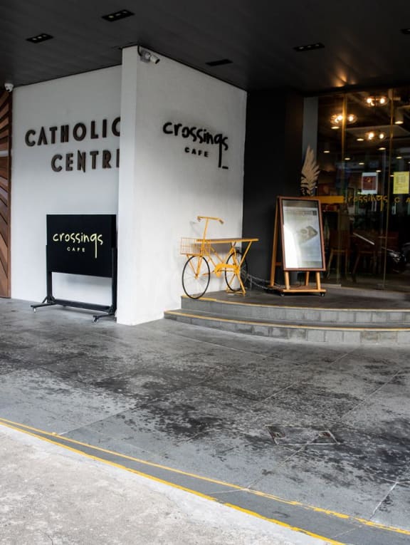 A view of the entrance to Catholic Centre where Crossings Cafe is located. A view of the entrance to Catholic Centre where Crossings Cafe is located.