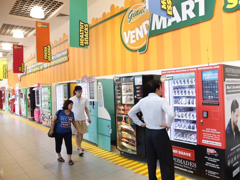 Patrons can buy chili crab and tudungs from vending machines at Giant Hypermarket Tampines. Photo: Najeer Yusof/TODAY