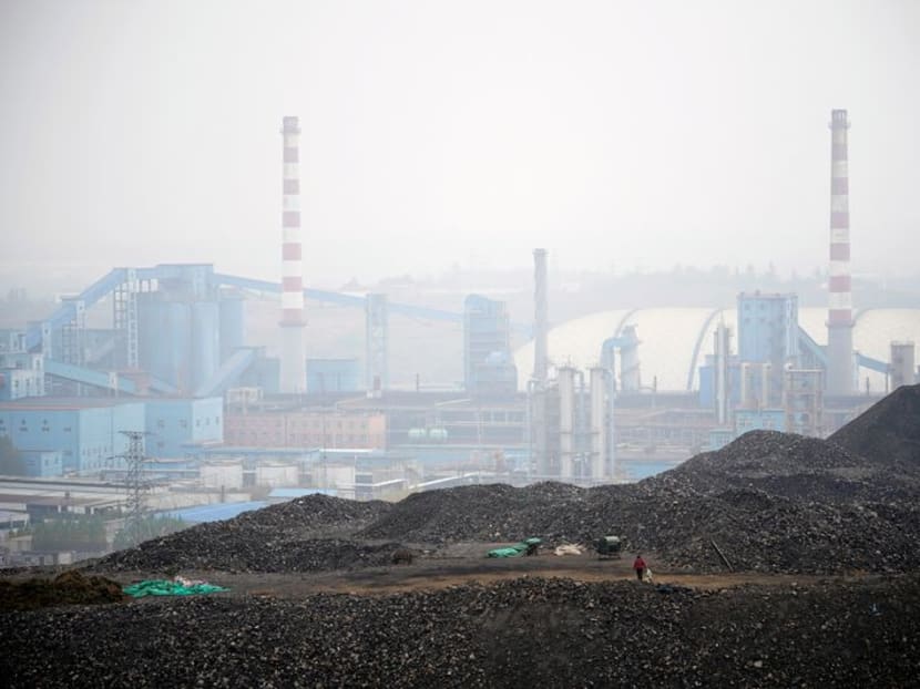 Dunes of low-grade coal are seen near a coal mine in Ruzhou, Henan province, China November 4, 2021. REUTERS/Aly Song/Files