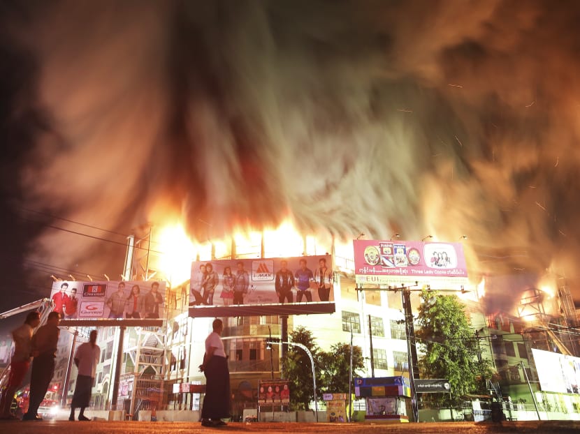 A fire destroyed more than 1,600 shops in Mingalar Market last year. There were no casualties, but the incident spooked many shop managers. Photo: Reuters