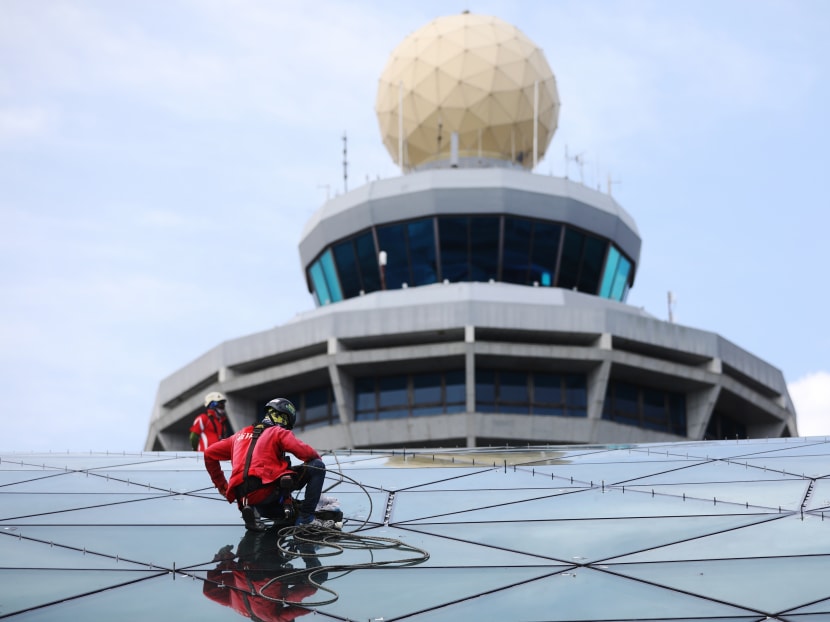 Photo of the day: Abseilers on the roof of the upcoming Jewel Changi Airport, seen against the control tower. Once opened, Jewel Changi Airport will have more than 134,000 sq m of indoor gardens, leisure attractions, retail and dining and a hotel.