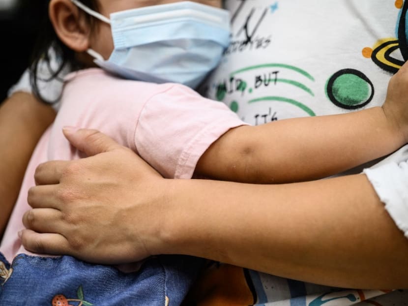In this picture taken on June 16, 2021, Ms Maggie and her daughter hug during an interview with AFP at the Concern for Grassroots' Livelihood Alliance charity group's centre in Hong Kong. On paper, Hong Kong is one of the world's wealthiest cities. But the city is also a poster child for inequality, and the other end of the spectrum tells a different story. In this picture taken on June 16, 2021, Ms Maggie and her daughter hug during an interview with AFP at the Concern for Grassroots' Livelihood Alliance charity group's centre in Hong Kong. On paper, Hong Kong is one of the world's wealthiest cities. But the city is also a poster child for inequality, and the other end of the spectrum tells a different story.