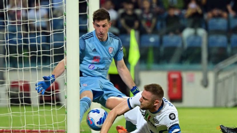 Inter take Serie A title race to final day with victory at Cagliari Inter take Serie A title race to final day with victory at Cagliari
