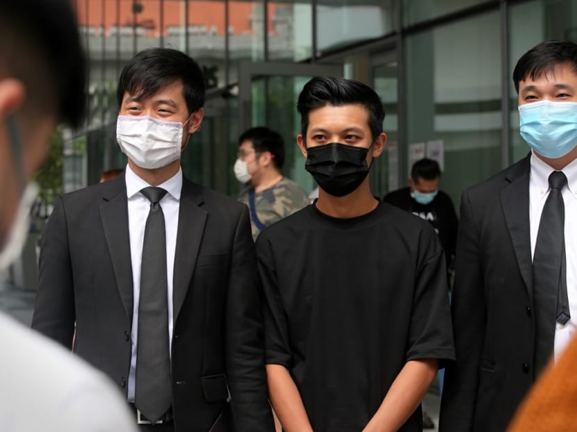 Chan Jia Xing (centre) with his lawyers Cory Wong (left) and Shane Yeo (right) from Invictus Law Corporation.