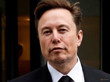 Tesla CEO Elon Musk and his security detail depart the company’s local office in Washington, US, on Jan 27, 2023