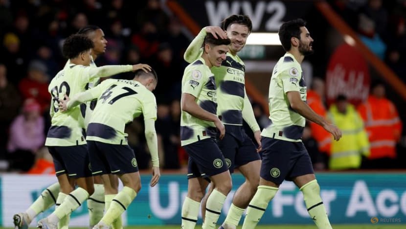Man City keep pressure on Arsenal with 4-1 win at Bournemouth