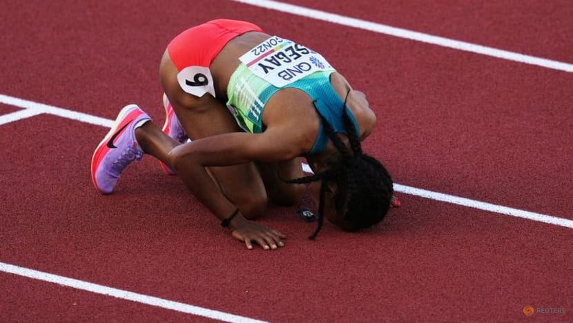 Ethiopia's Tsegay holds on to win world 5,000m gold Ethiopia's Tsegay holds on to win world 5,000m gold