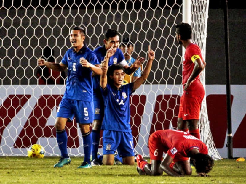 The Lions (in red) crashed out of the group stage of the Asean Football Federation (AFF) Suzuki Cup for the second consecutive edition last year. The dismal state of the national team is one thing that the new leadership of the Football Association of Singapore will need to address. TODAY FILE PHOTO