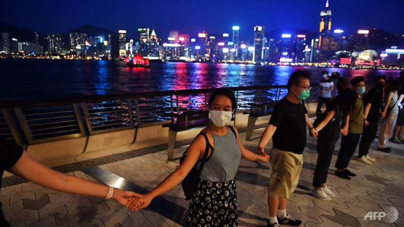 Hong Kong protesters form massive human chain across the city Hong Kong protesters form massive human chain across the city
