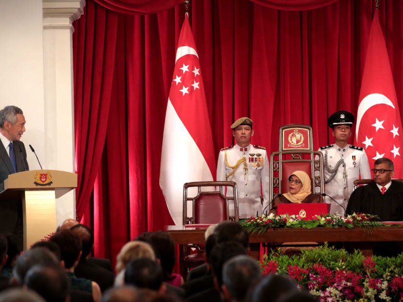 President Halimah Yacob looks on as Prime Minister Lee Hsien Loong speaks at the swearing in ceremony on 14 Sept, 2017. Photo: Jason Quah/TODAY