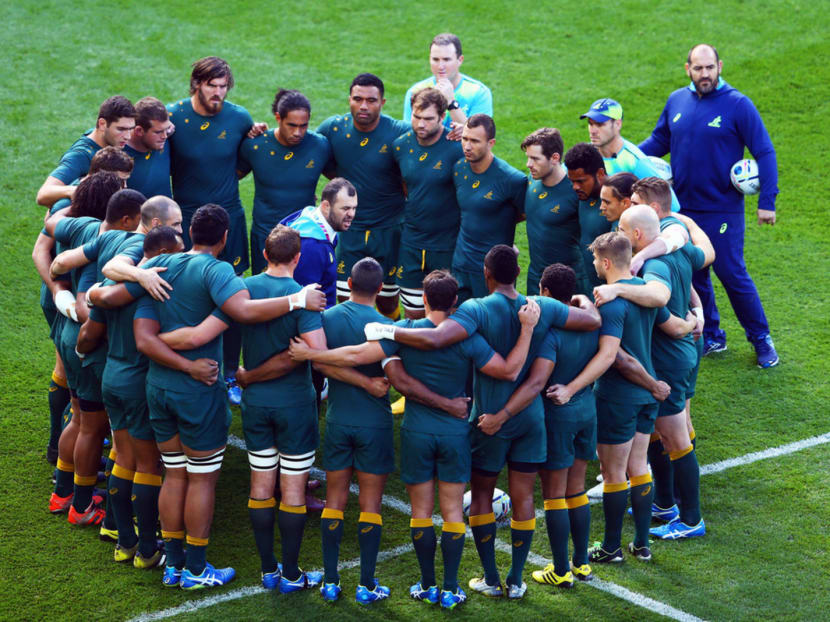 Since coming on board late last year, Michael Cheika (centre) has fixed areas the Australian team were weak in. More importantly, he restored a sense of belief and respect in his squad. Photo: Getty Images