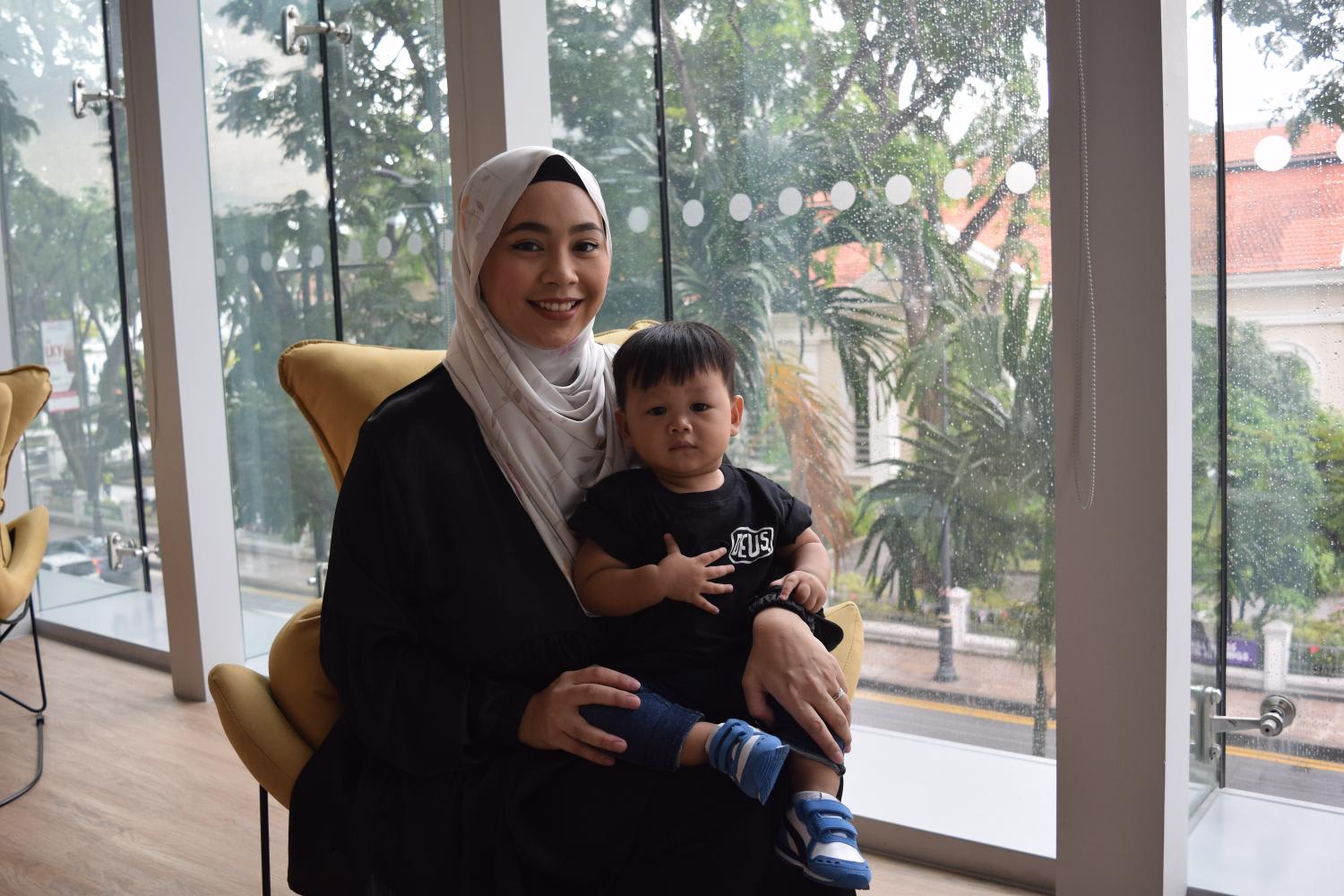 Ms Nur Saiyidah Mohd Nordin juggled taking of her children with picking up new skills to pursue a career in logistics. Photos: NTUC LearningHub
