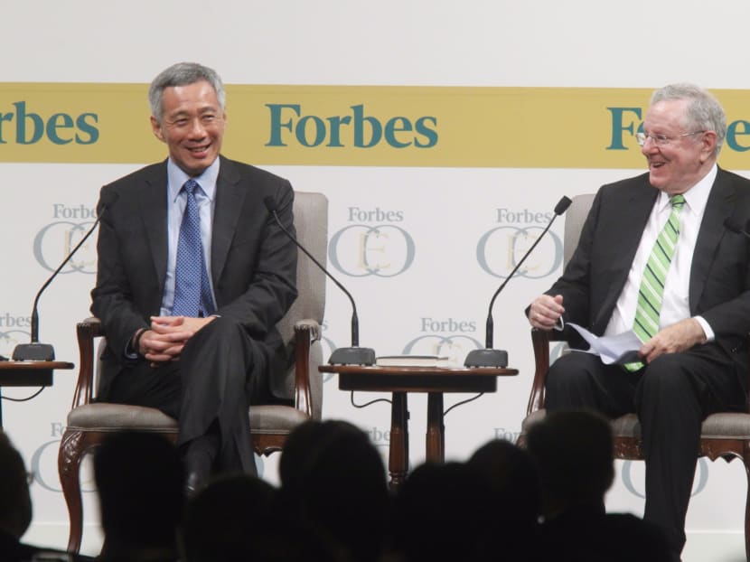 Prime Minister Lee Hsieng Loong (left) and Steve Forbes, Chairman and Editor-in-Chief of Forbes Media LLC, at the 14th annual Forbes Global CEO Conference on Oct 28, 2014. Photo. Ernest Chua.