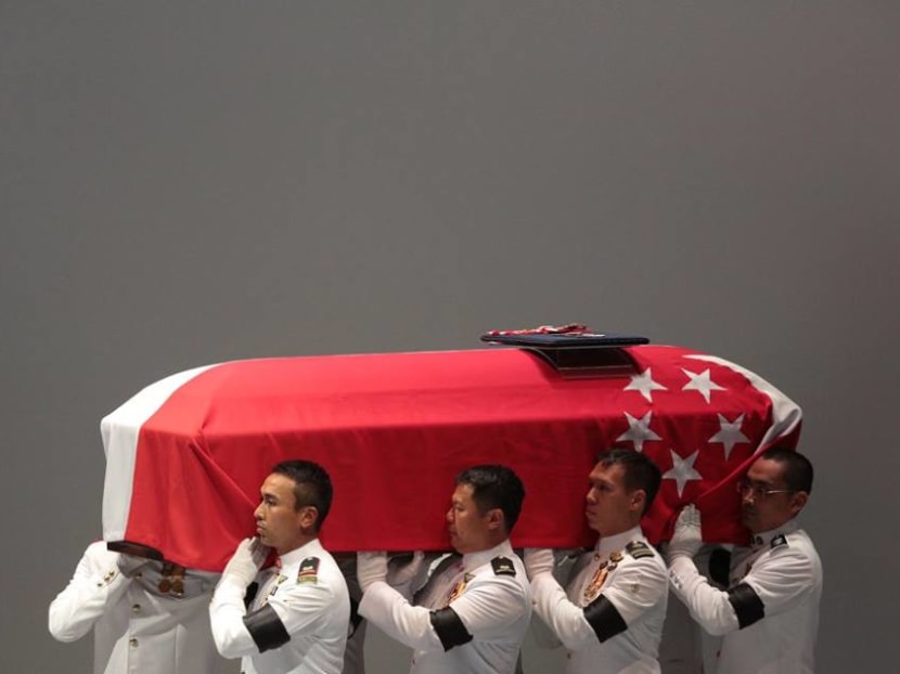 Pallbearers bring the casket into the University Cultural Centre on Aug 26, 2016. Photo: Jason Quah/TODAY