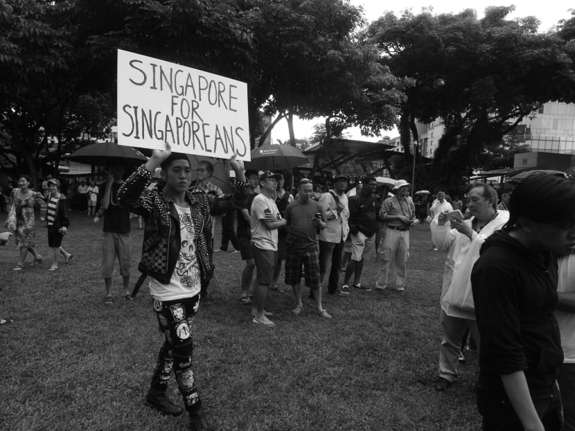 A placard seen during a protest at the Speakers’ Corner in February last year. The spike in the foreigner population has been blamed for problems such as overcrowding in public transport and the shortage of beds in hospitals. Today File Photo