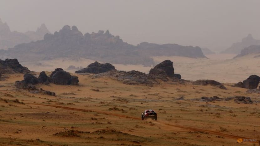 Qatar's Al-Attiyah takes Dakar lead as Sainz hits trouble Qatar's Al-Attiyah takes Dakar lead as Sainz hits trouble