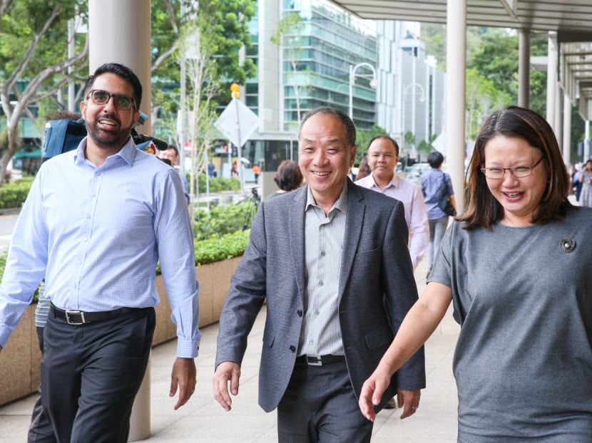Photo of the day: Workers' Party MPs (from left) Pritam Singh, Low Thia Khiang and Sylvia Lim leaving the Supreme Court for lunch after attending the Aljunied-Hougang Town Council trial on Monday (Oct 8).