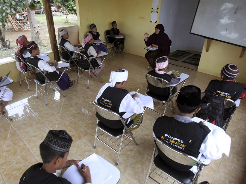 Gallery: Islamic school in Indonesia seeks to steer sons of militants to new path
