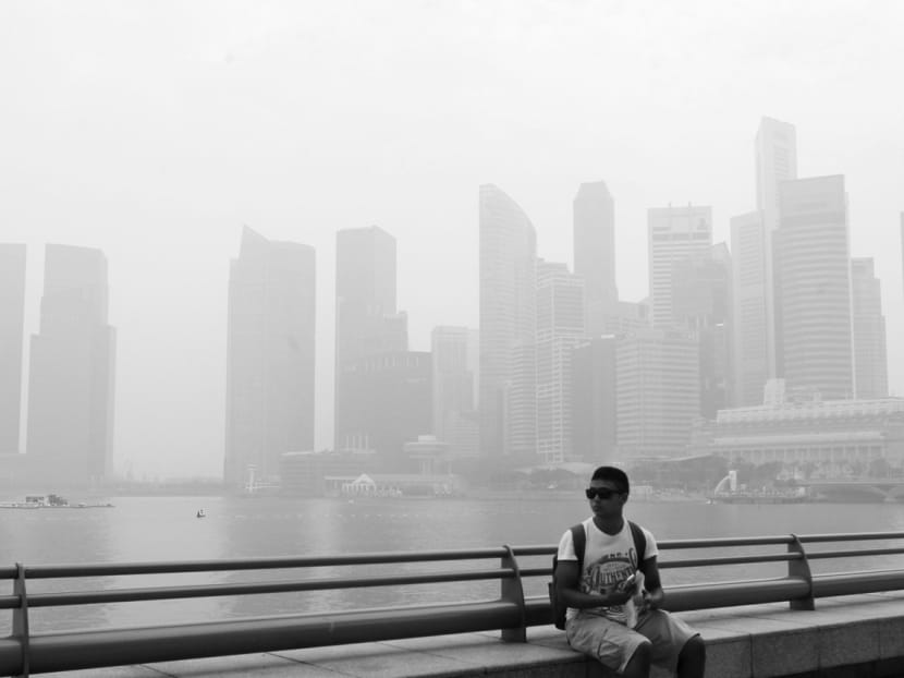 The central business district in Singapore shrouded in haze. ASEAN’s indecisiveness in dealing with the prolonged haze episode has exposed the body’s limitations as an institution going forward. TODAY file photo