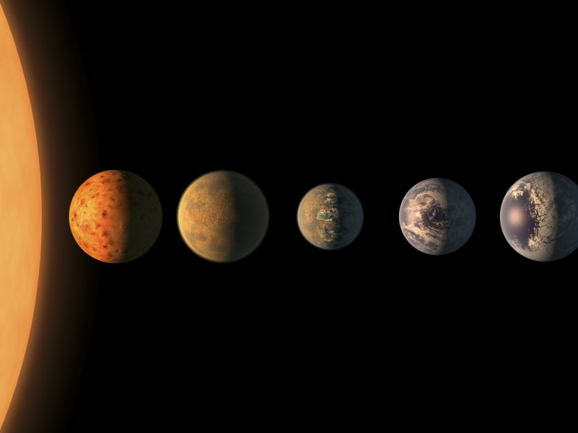In an undated handout image, an artist's rendering of the seven planets that orbit the star named Trappist-1. Photo: NASA/JPL-Caltech via The New York Times