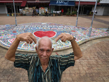 77-year-old retiree completes mural in Bedok using 80,000 bottle caps