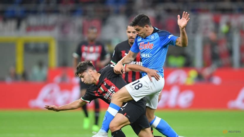 Simeone header earns Napoli 2-1 win at AC Milan Simeone header earns Napoli 2-1 win at AC Milan