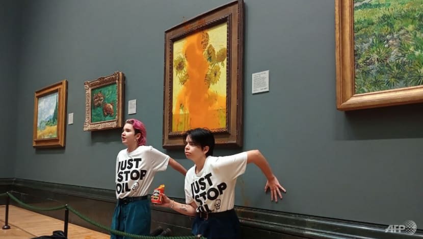 Eco-activists throw soup on Van Gogh's Sunflowers in London Eco-activists throw soup on Van Gogh's Sunflowers in London