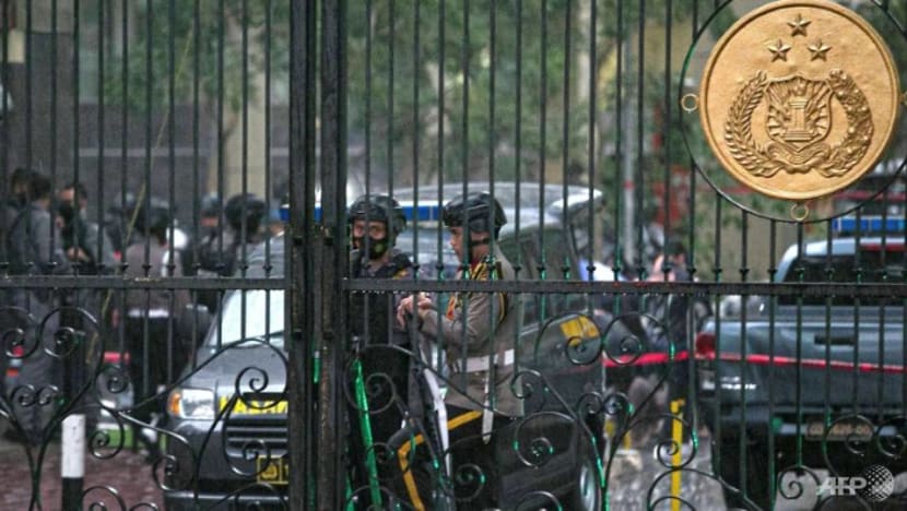 Female 'lone wolf' attacker killed during gunfight at police headquarters in Jakarta Female 'lone wolf' attacker killed during gunfight at police headquarters in Jakarta