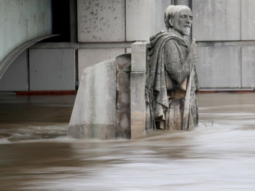Waters of the river Seine rising on the statue of the Zouave at the Alma bridge in Paris. Photo: AFP