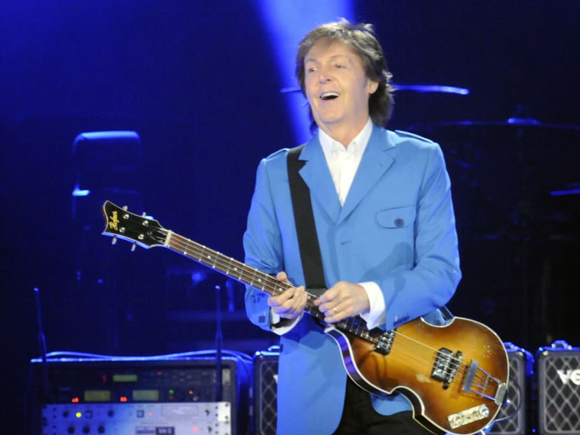 Sir Paul McCartney performs with his band during the “Out There" Tour at the Times Union Center on Saturday, July 5, 2014, in Albany, NY. Photo: AP