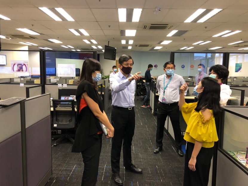Trade and Industry Minister Chan Chun Sing at a dedicated call centre on June 16, 2020. It was set up to answer questions businesses have during and after the circuit breaker to contain Covid-19.